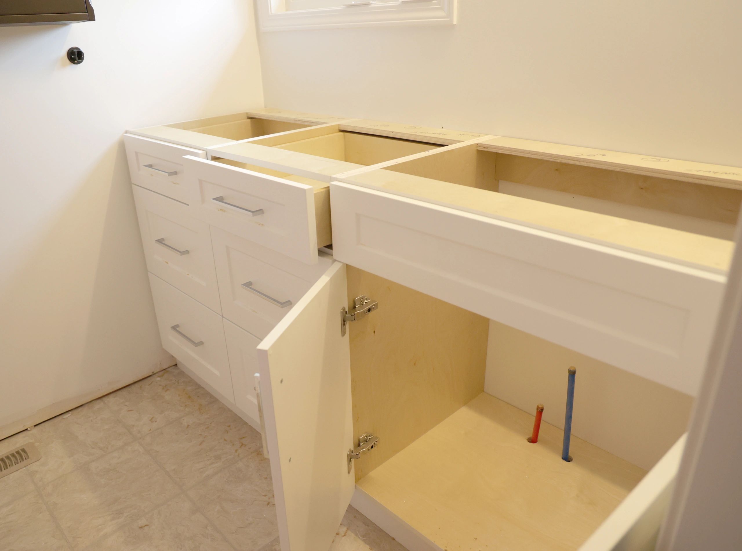 Bathroom vanity cabinetry in a renovated home