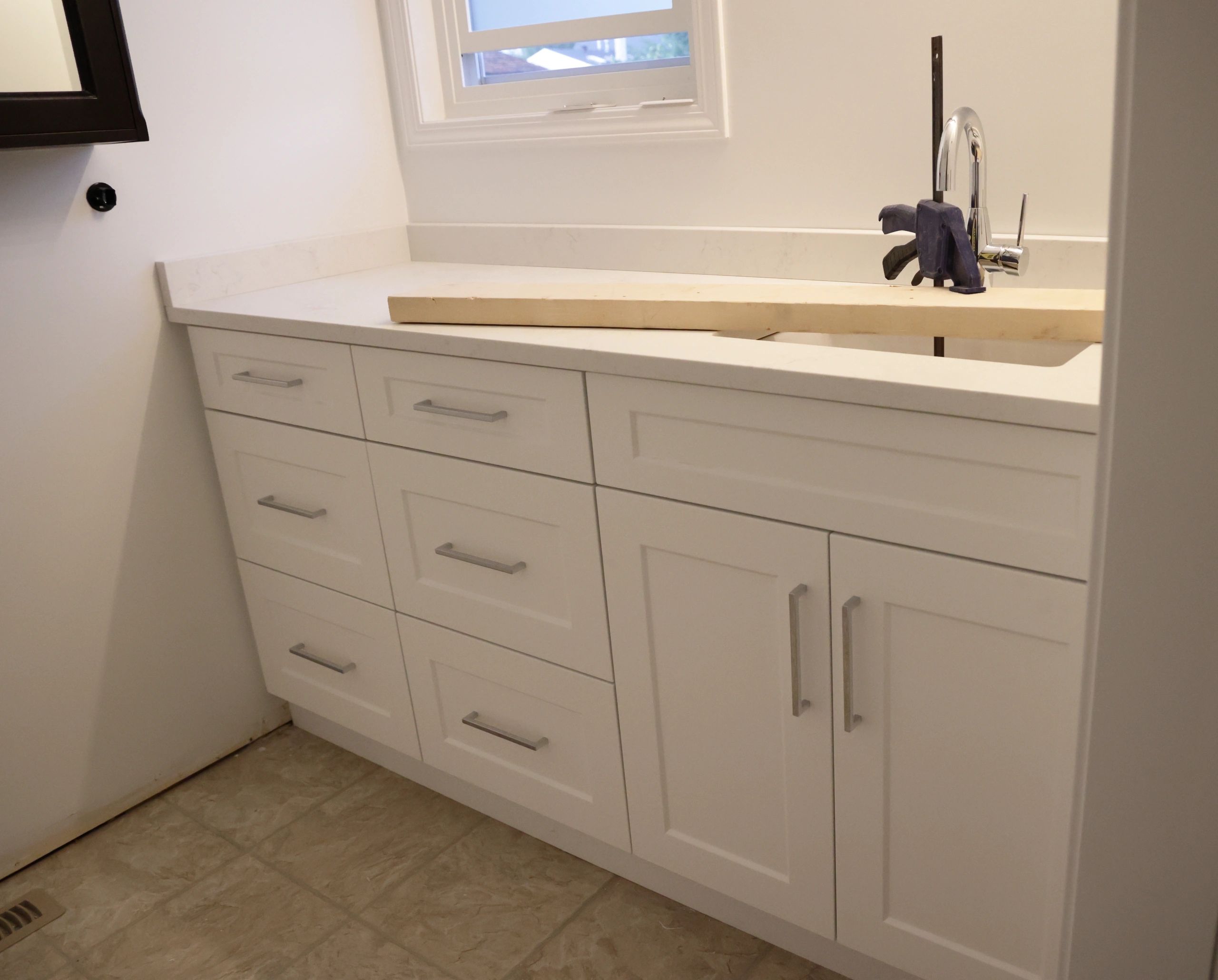 Bathroom vanity cabinetry with countertop